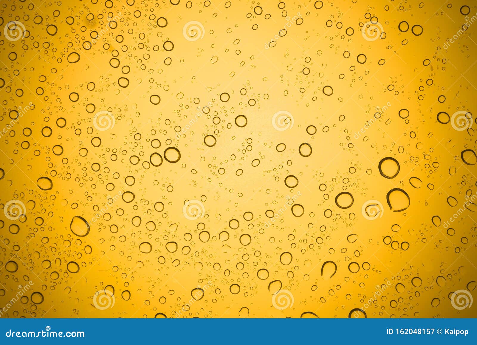 Water Drops on Yellow Glass, Rain Droplets on Glass Background Stock