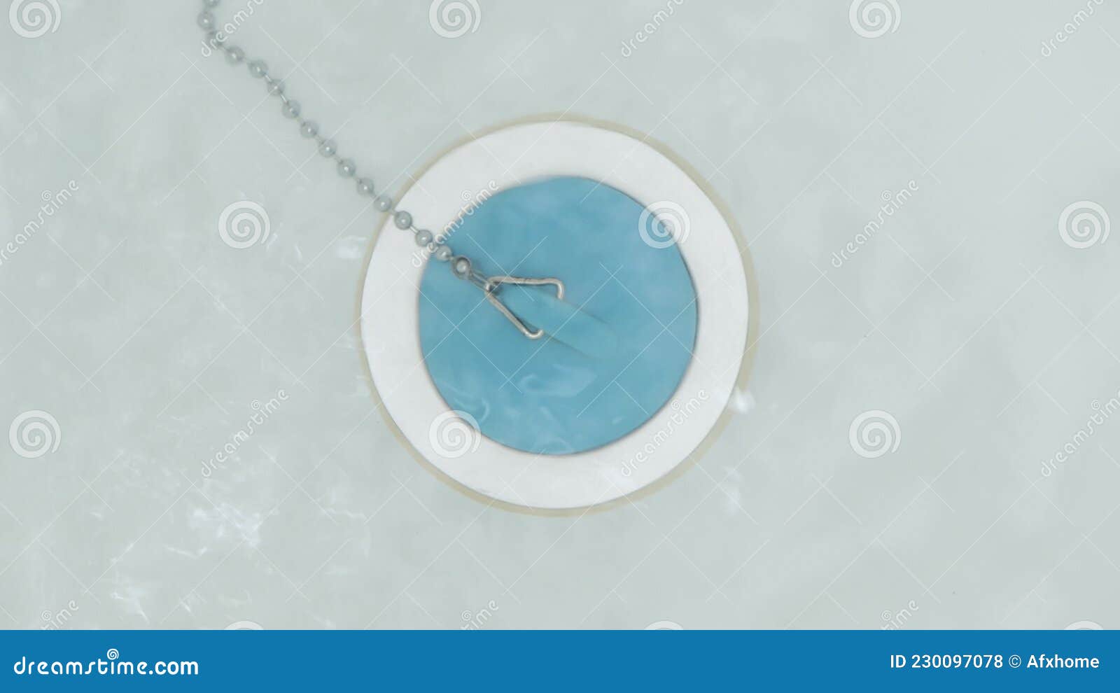The Water Entering the Bathtub Drain is Plugged with a Blue Plug, Top