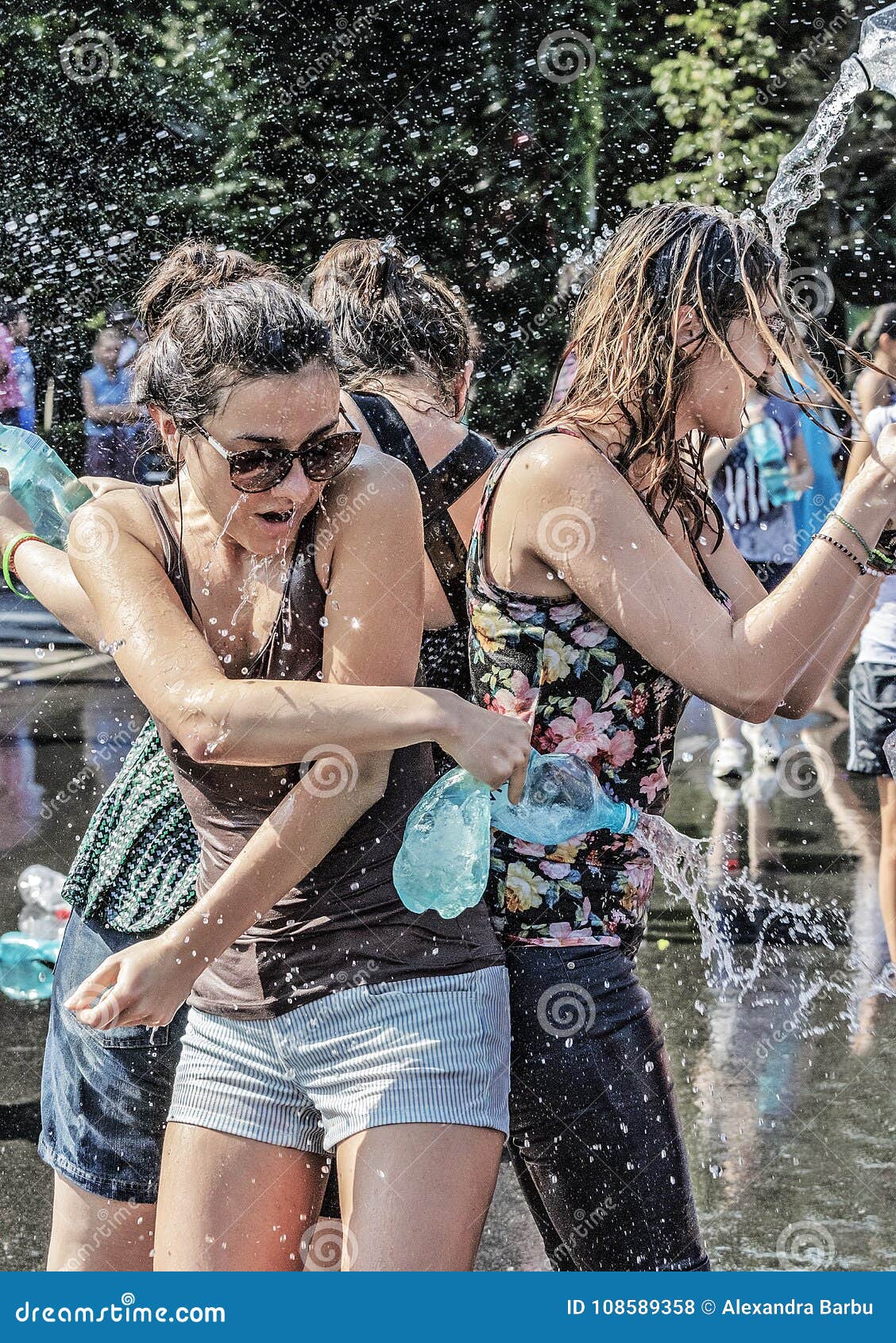 https://thumbs.dreamstime.com/z/water-fight-day-celebrated-bucharest-street-water-fight-event-bucharest-people-having-fun-summer-cooling-108589358.jpg