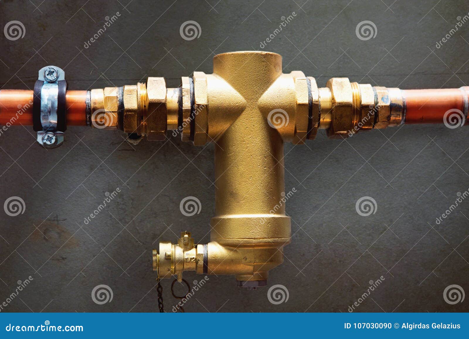 Water Filter for Central Heating System on a Wall. Stock Photo Image