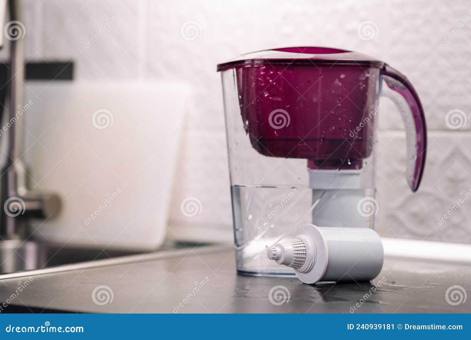 Water Filter Plastic Jug with a New Replaceable Cartridge. Replaceable