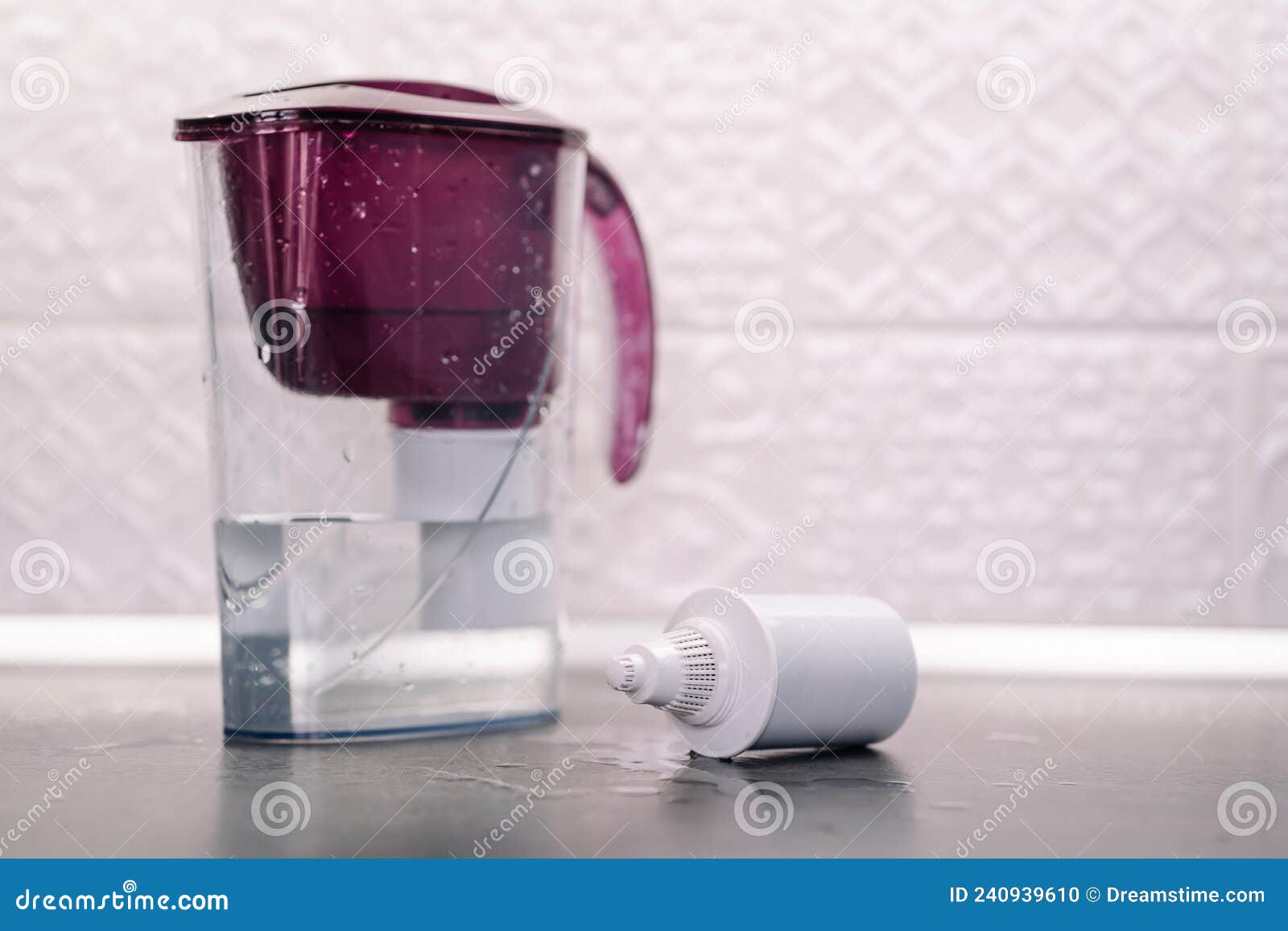 Water Filter Plastic Jug with a New Replaceable Cartridge. Replaceable