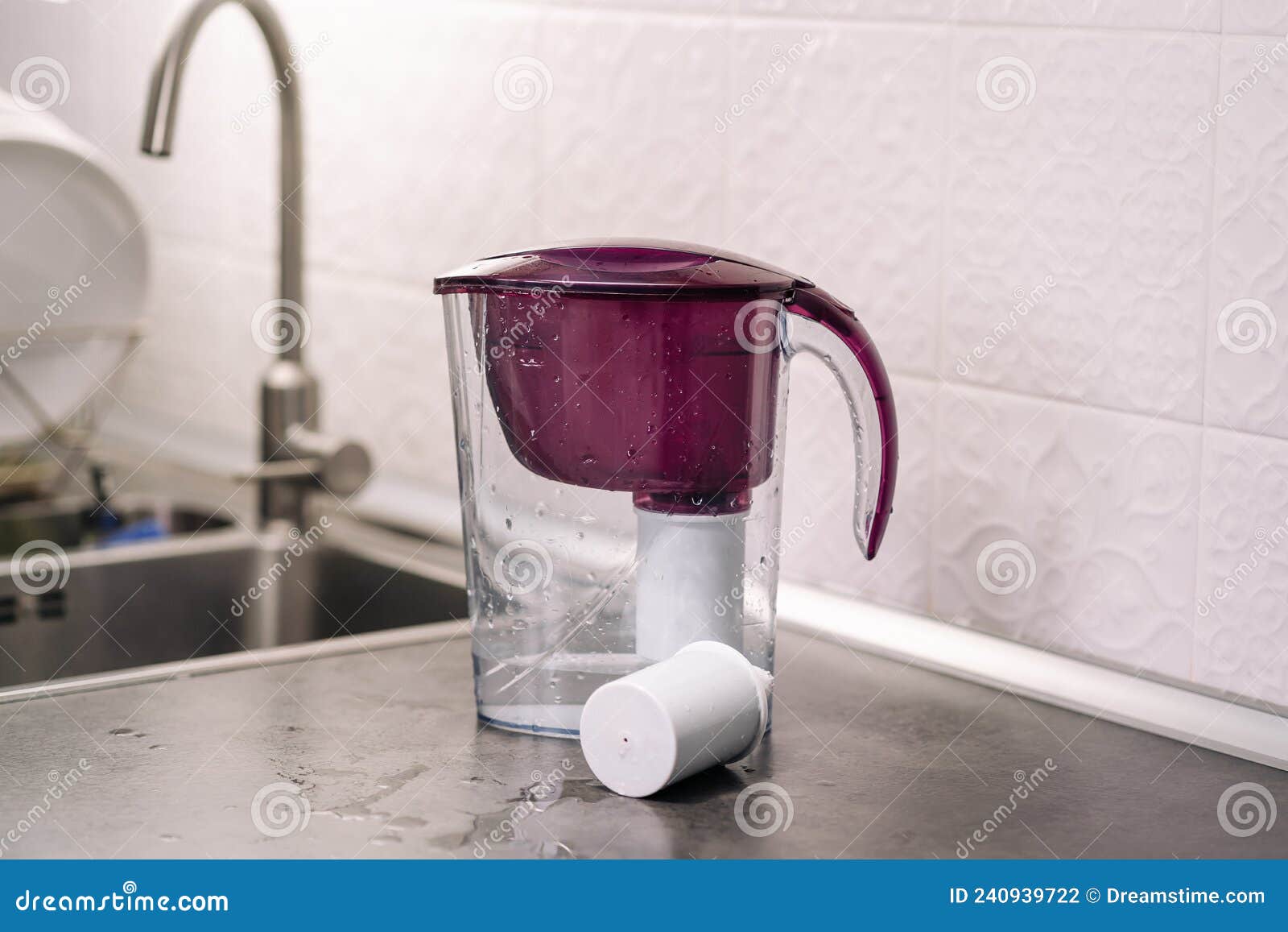 Water Filter Plastic Jug with a New Replaceable Cartridge. Replaceable