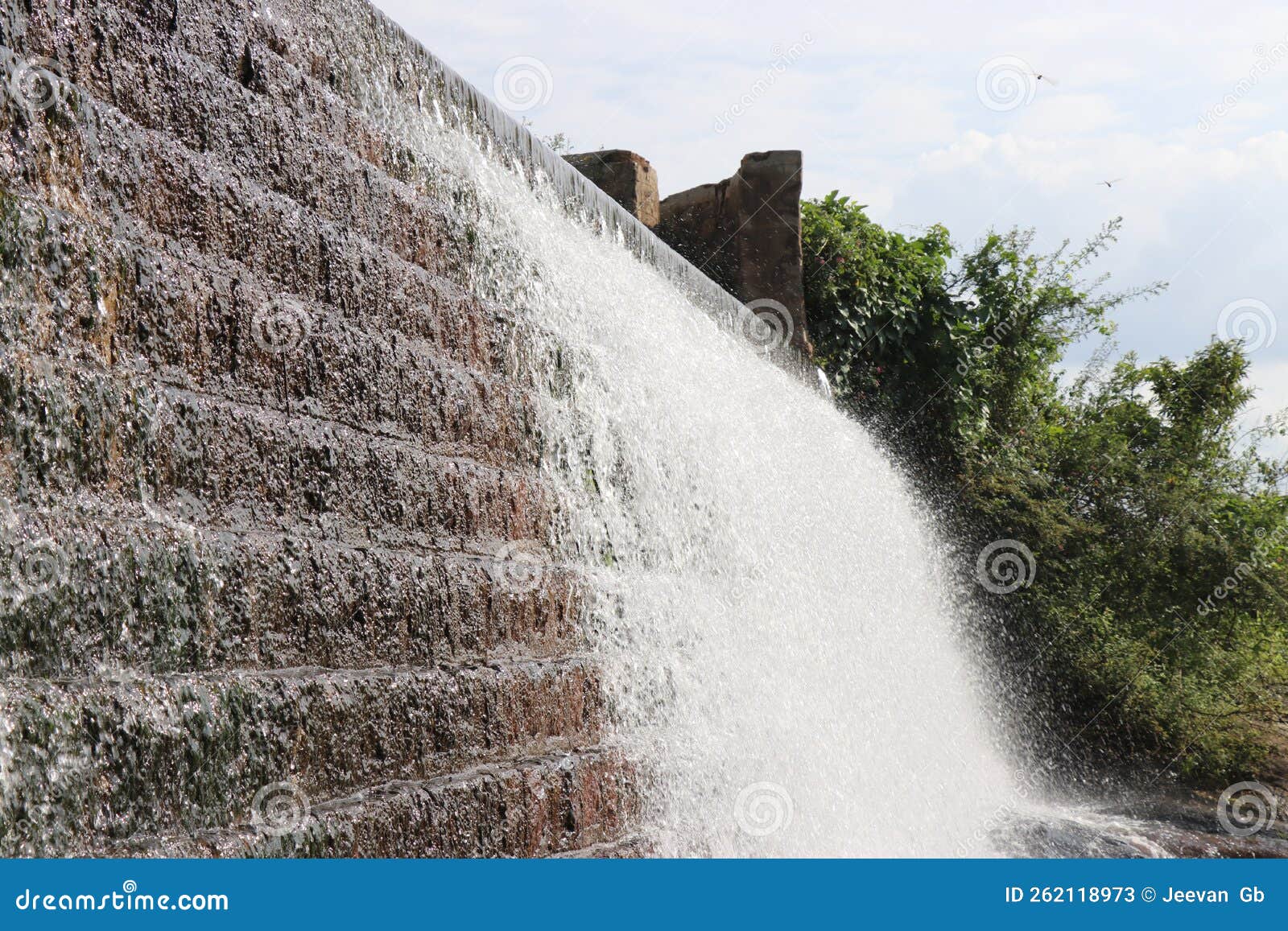 Water Flowing through Bricks from a Overflowing Dams Reservoir Stock