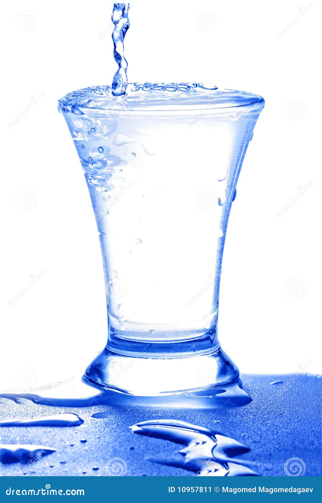 Water flowing into glass stock image. Image of leak, squirt 10957811