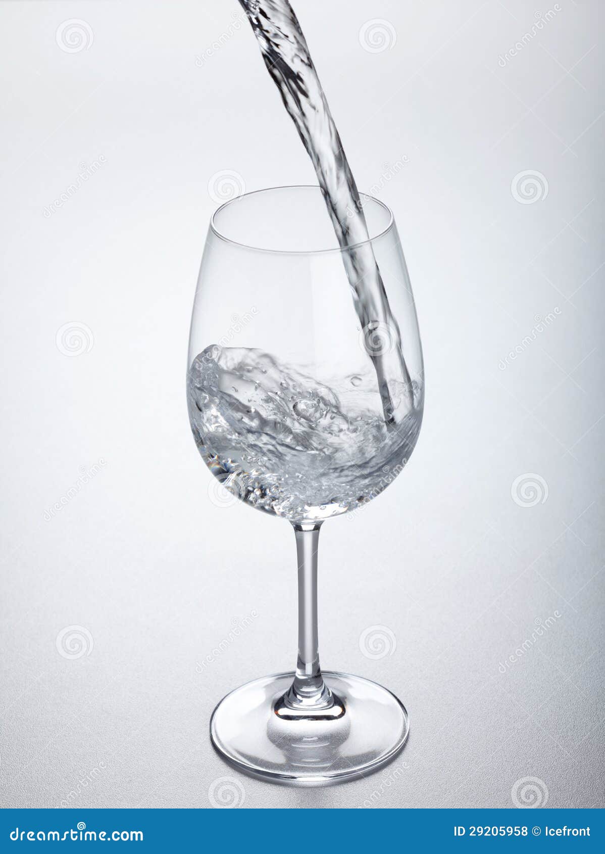 Water flowing into glass stock photo. Image of liquid 29205958