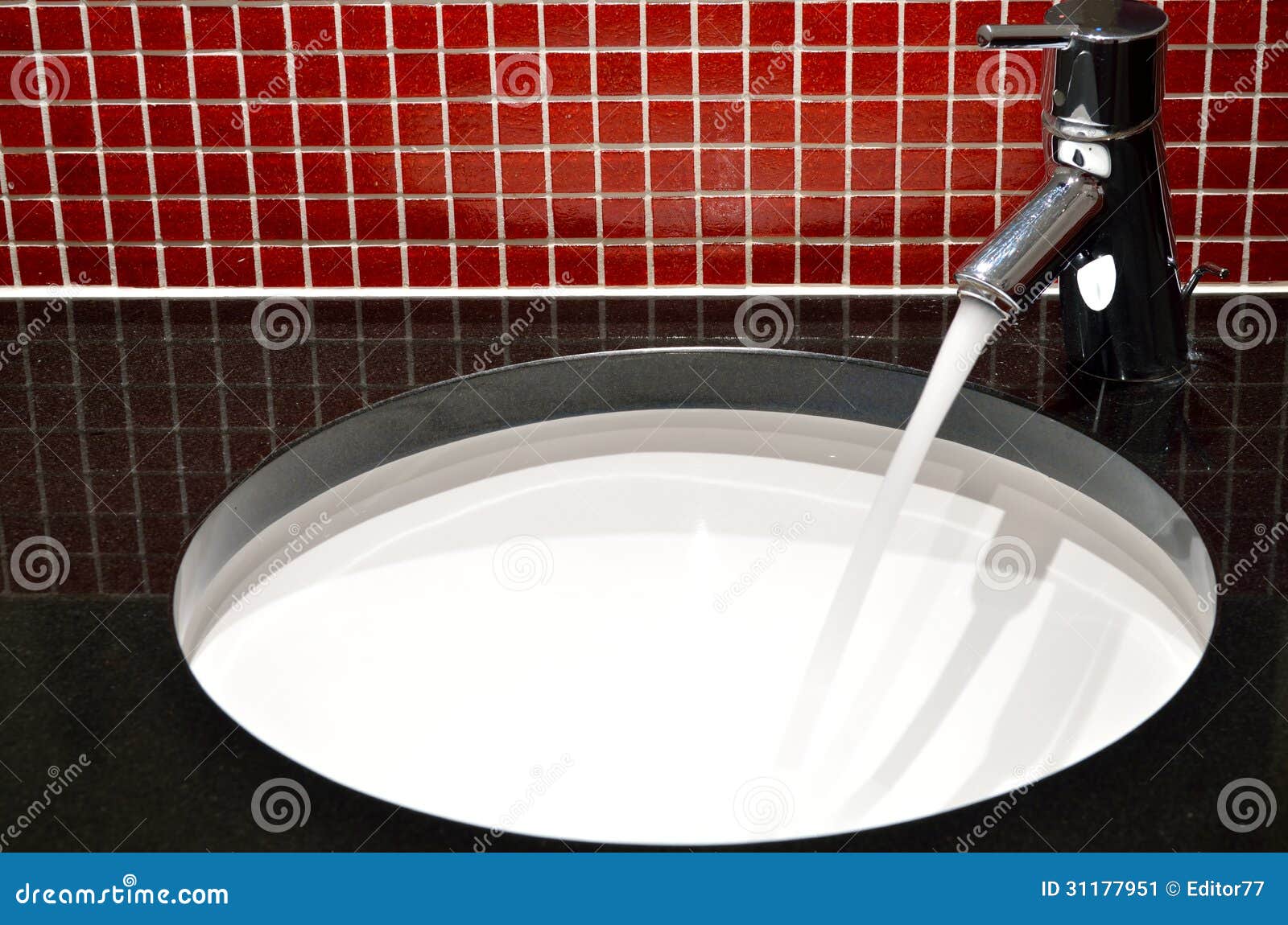 Water flowing in the sink stock image. Image of white 31177951