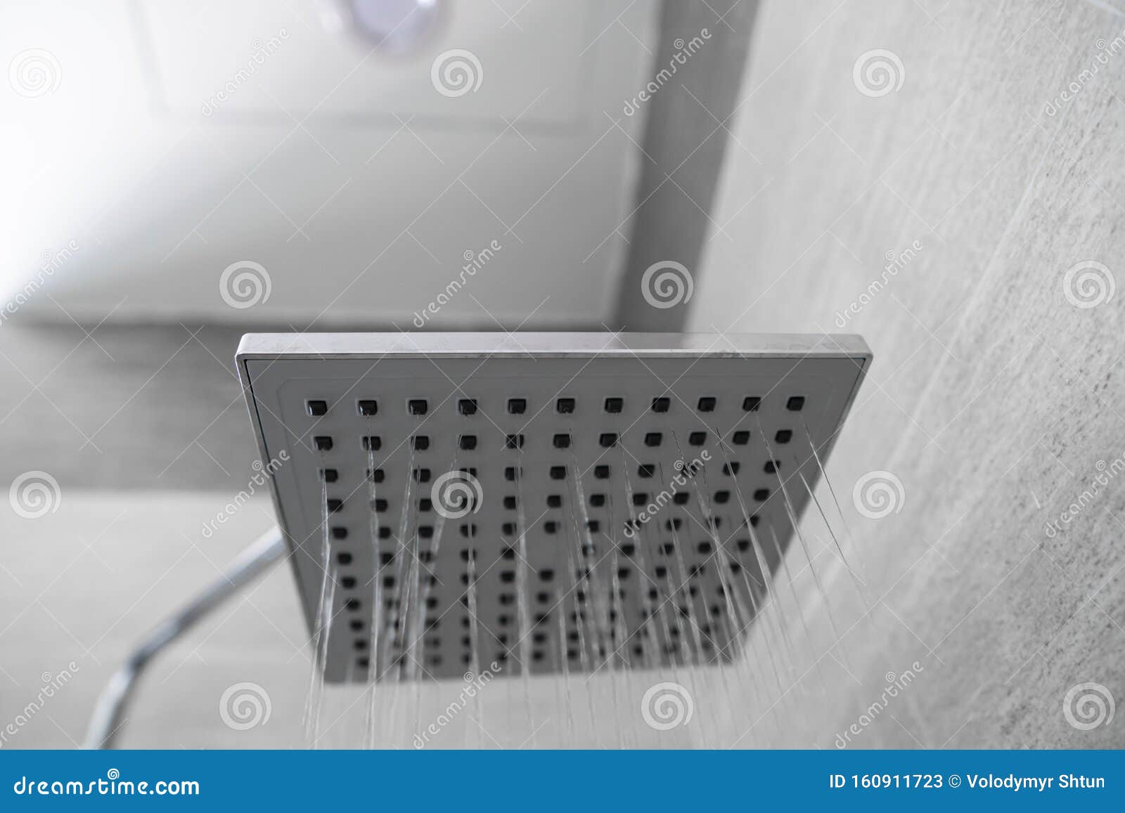 Water Flowing from the Square Shower Head in a Modern Bathroom. Shower ...