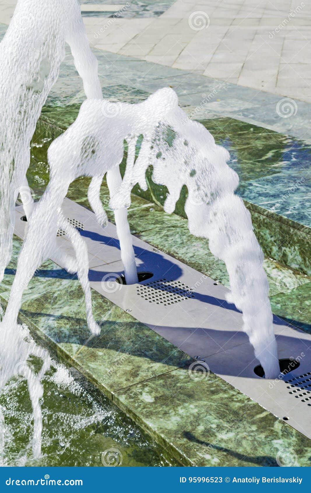 Water Fountain Jets, Toned Image, Closeup. Stock Image Image of blue