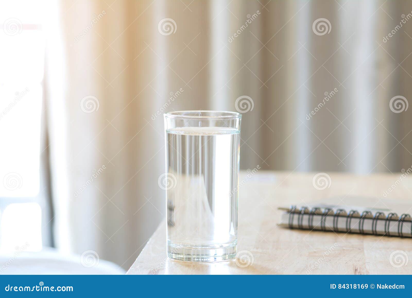 Water Glass on Wood Table with Notebook Stock Image Image of clean
