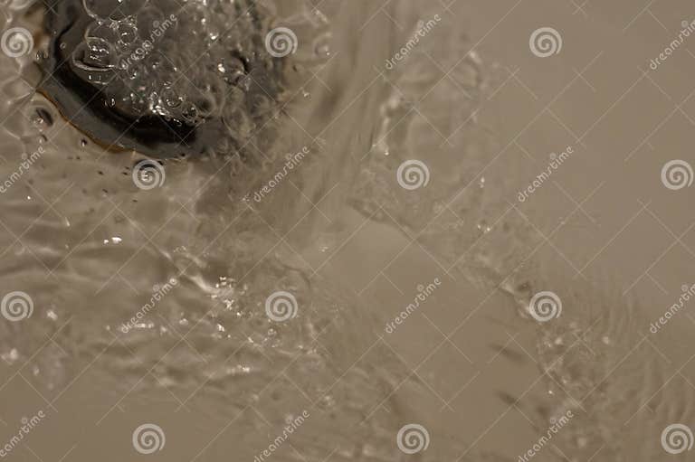 Water going down the drain stock image. Image of fresh 206949421