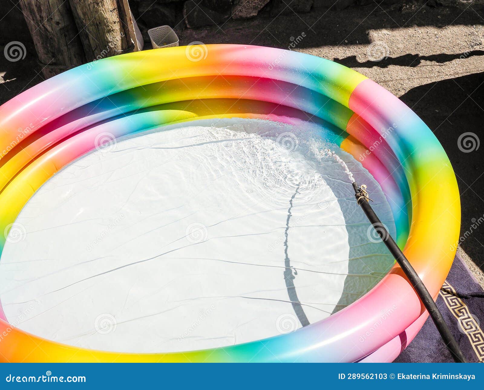 Water from Hose is Drawn into Inflatable Pool Stock Image Image of