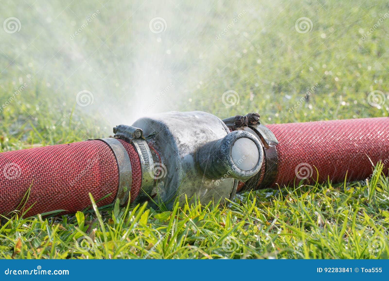 Water Leaking from Hole in a Industrial Hose. Stock Image Image of
