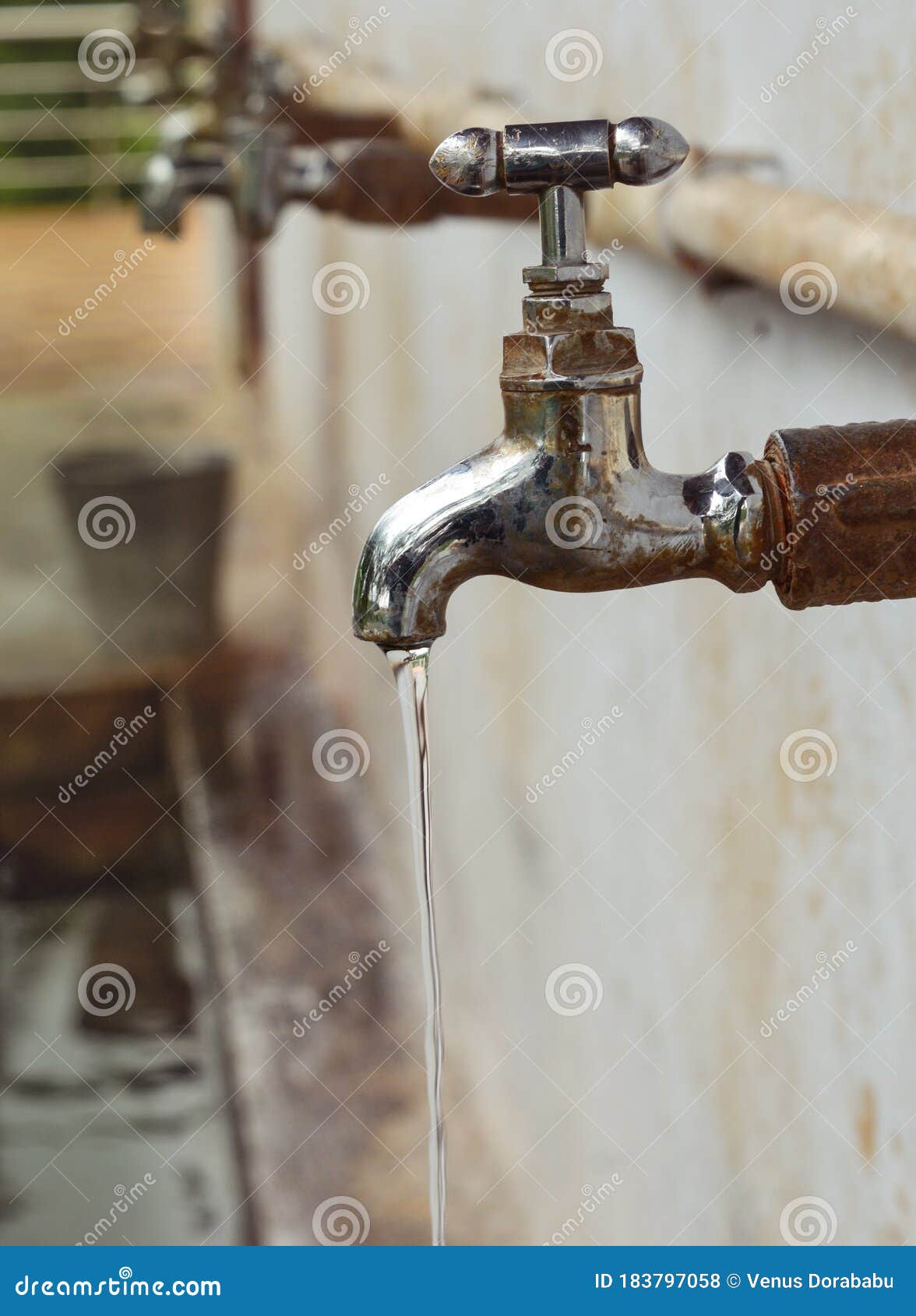 Water Leaking through a Tap. Stock Photo Image of waterwastage