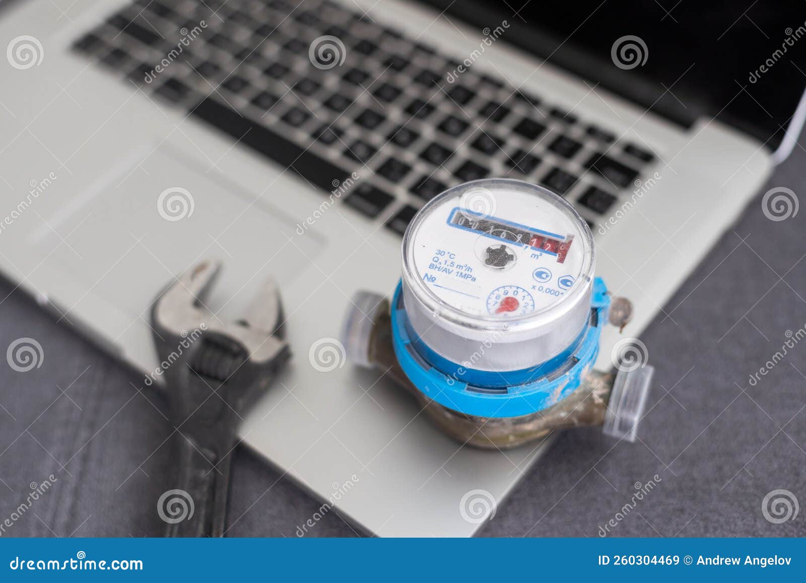 Water Meter and Laptop Background Stock Image - Image of technology