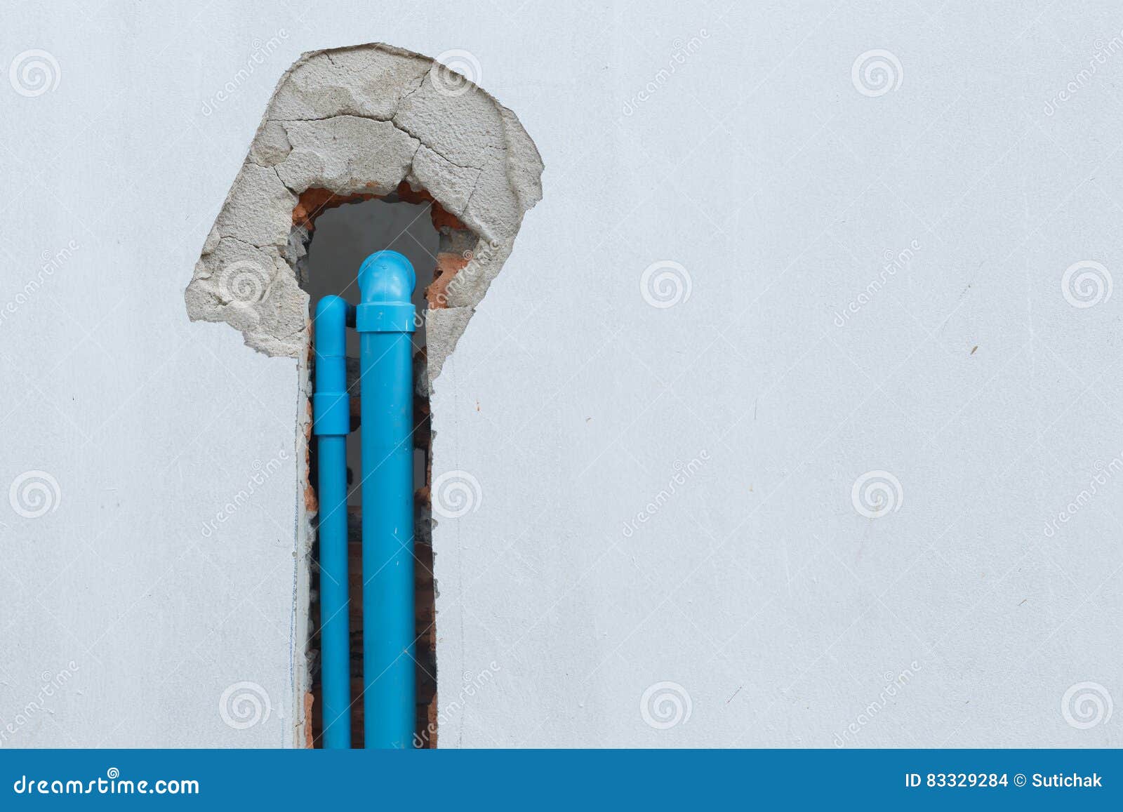 Water Pipe Pvc Plumbing Under Cement Wall in Construction Site Stock