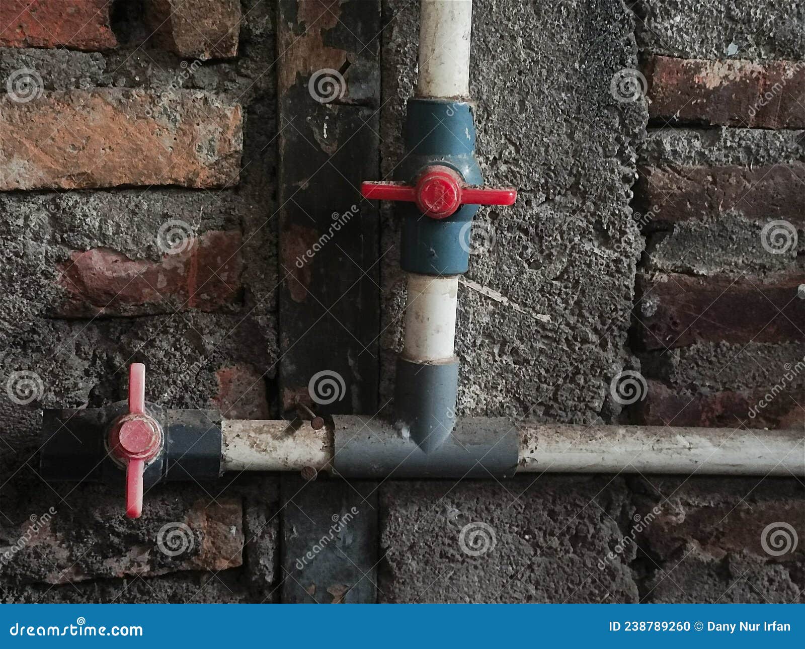 Water Pipes in the Brick Wall Stock Photo Image of floor, street 238789260