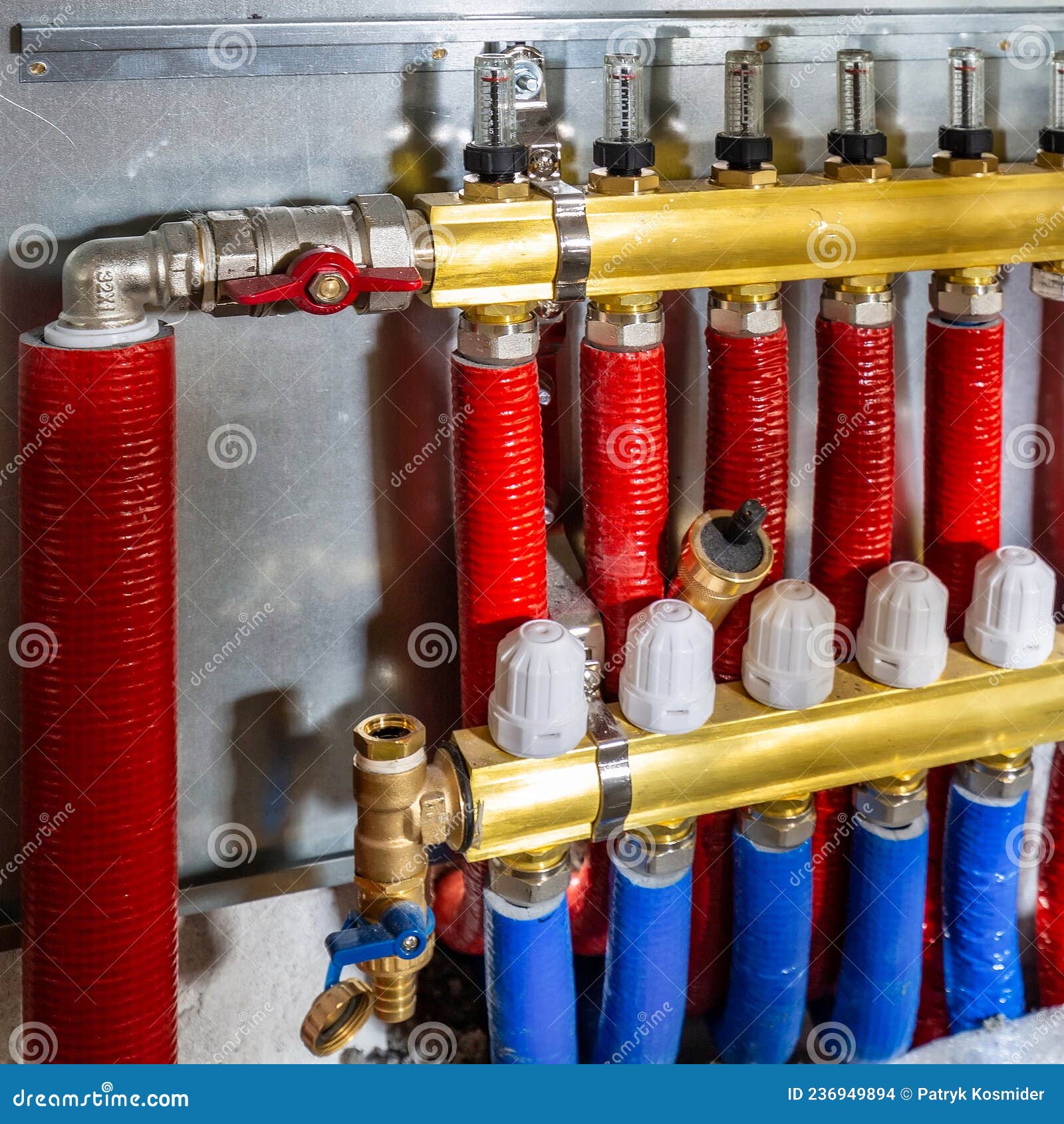 Water Pipes of Central Heating System in Boiler Room Stock Photo