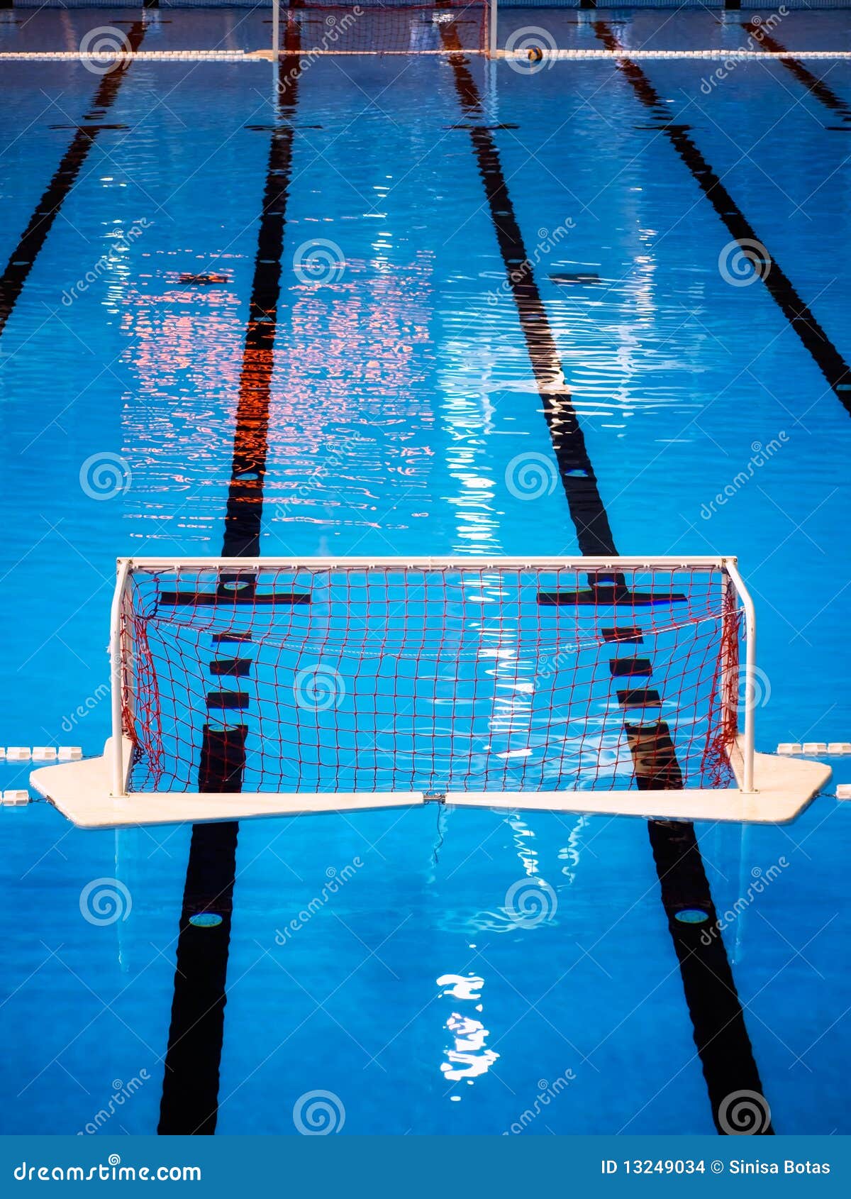 A Water Polo Ball Floating On The Water In A Pool Royalty-Free Stock ...