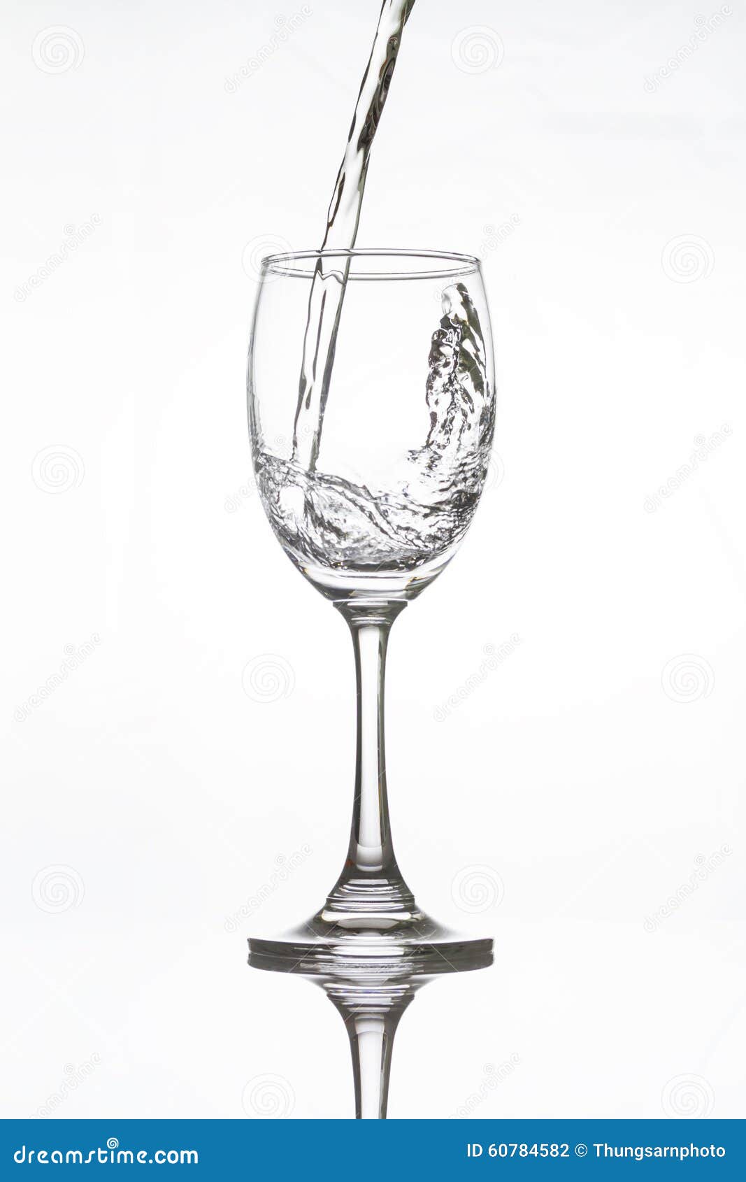 Water Pouring into Vine Glass on White Stock Photo Image of splashing