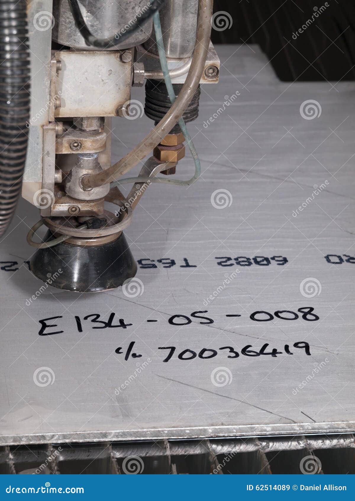 Water Pressure Cutting through Stainless Steel Materials Stock Image
