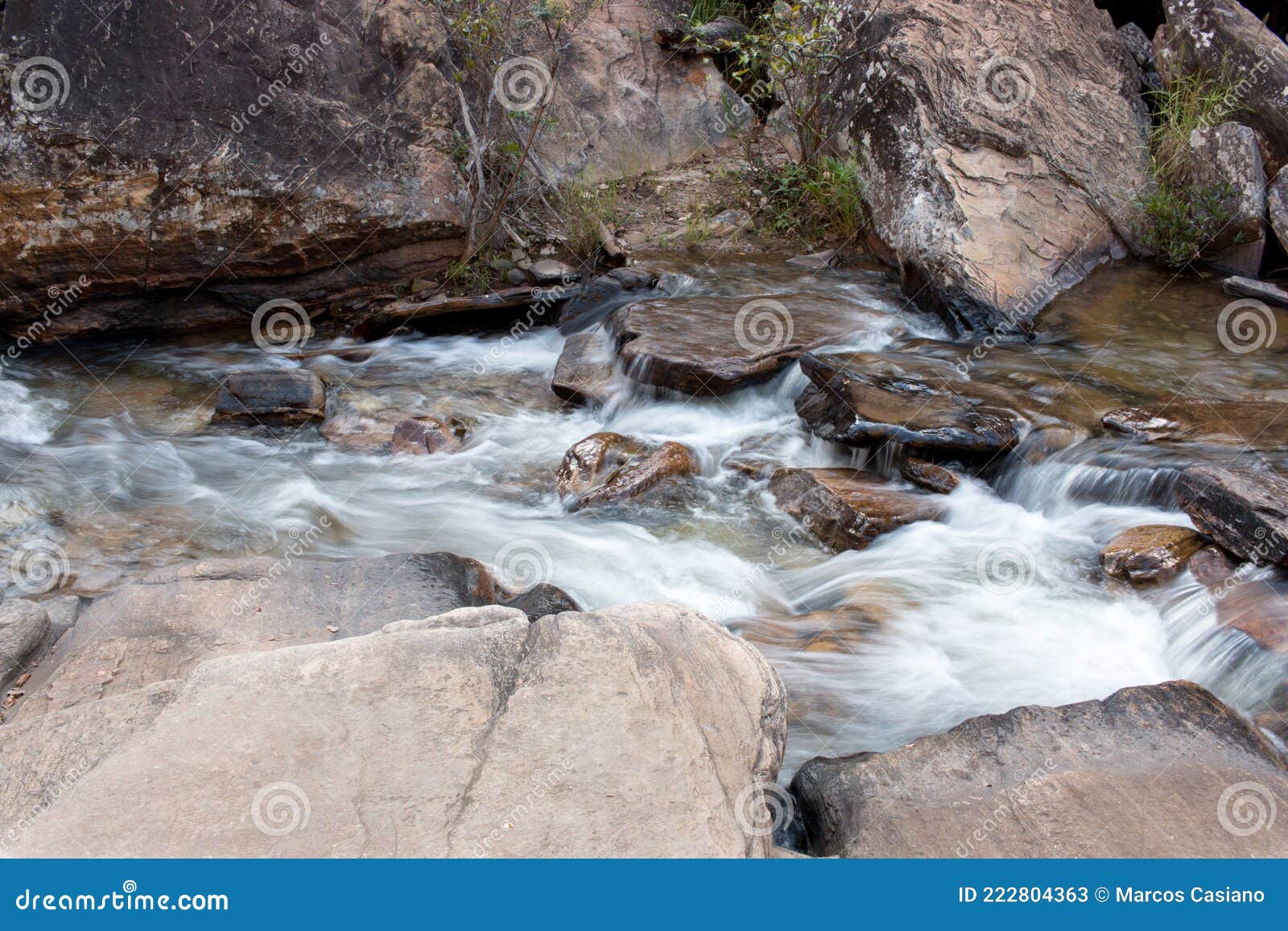 water rushing down the small river at waterfall old mill or chachoeira da usina velha