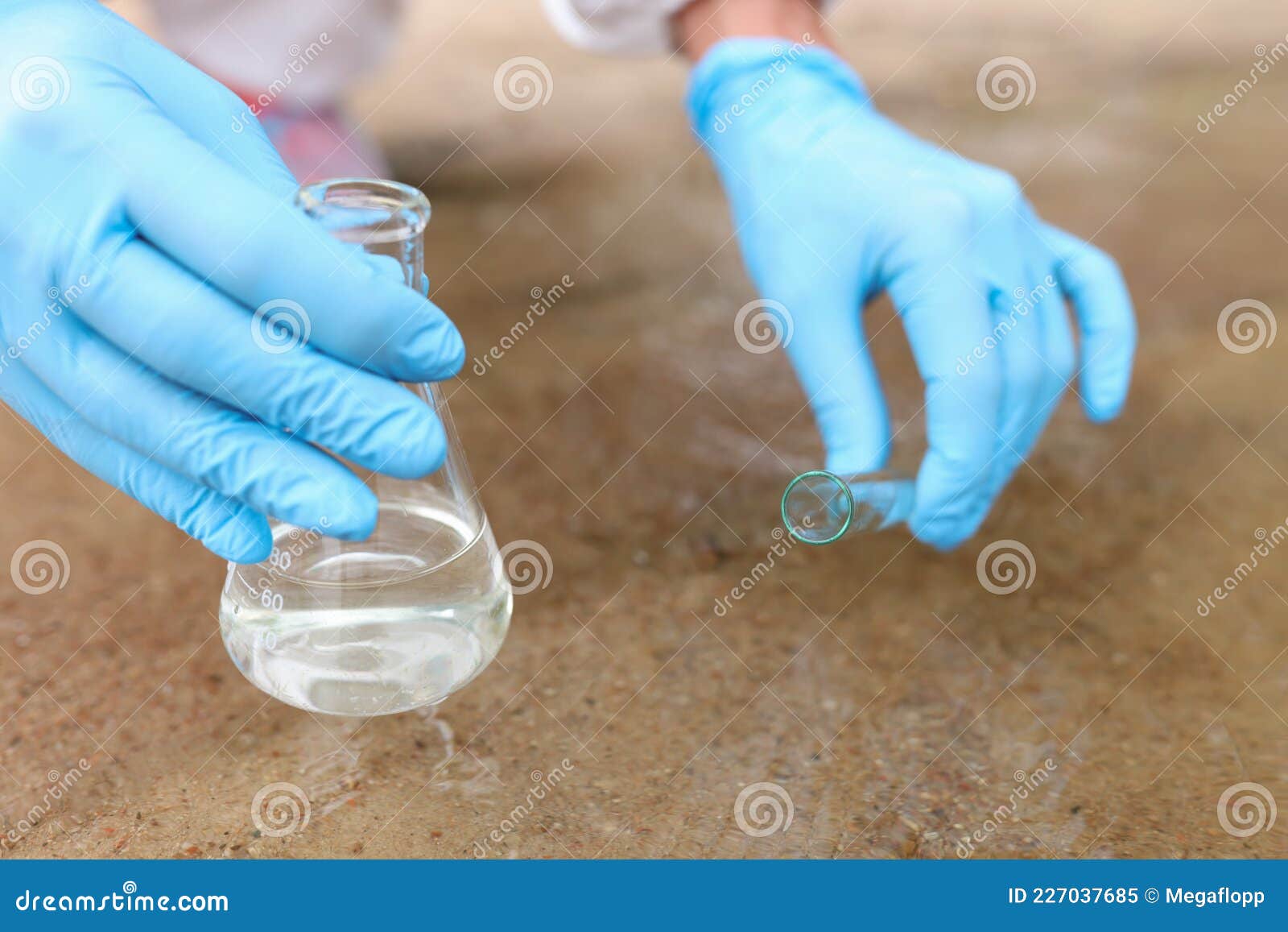 Water Samples from River for Analysis in Flask Closeup Stock Image