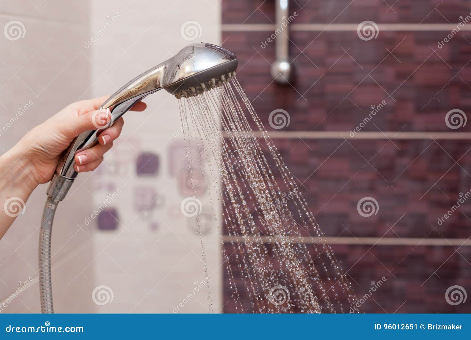 Water Streams Flow Out of Working Shower Head Right Down. Stock Image