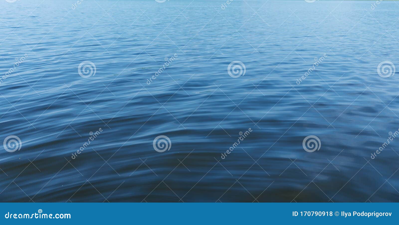 The Water Surface of the Blue Water of Lake Baikal. Texture Background