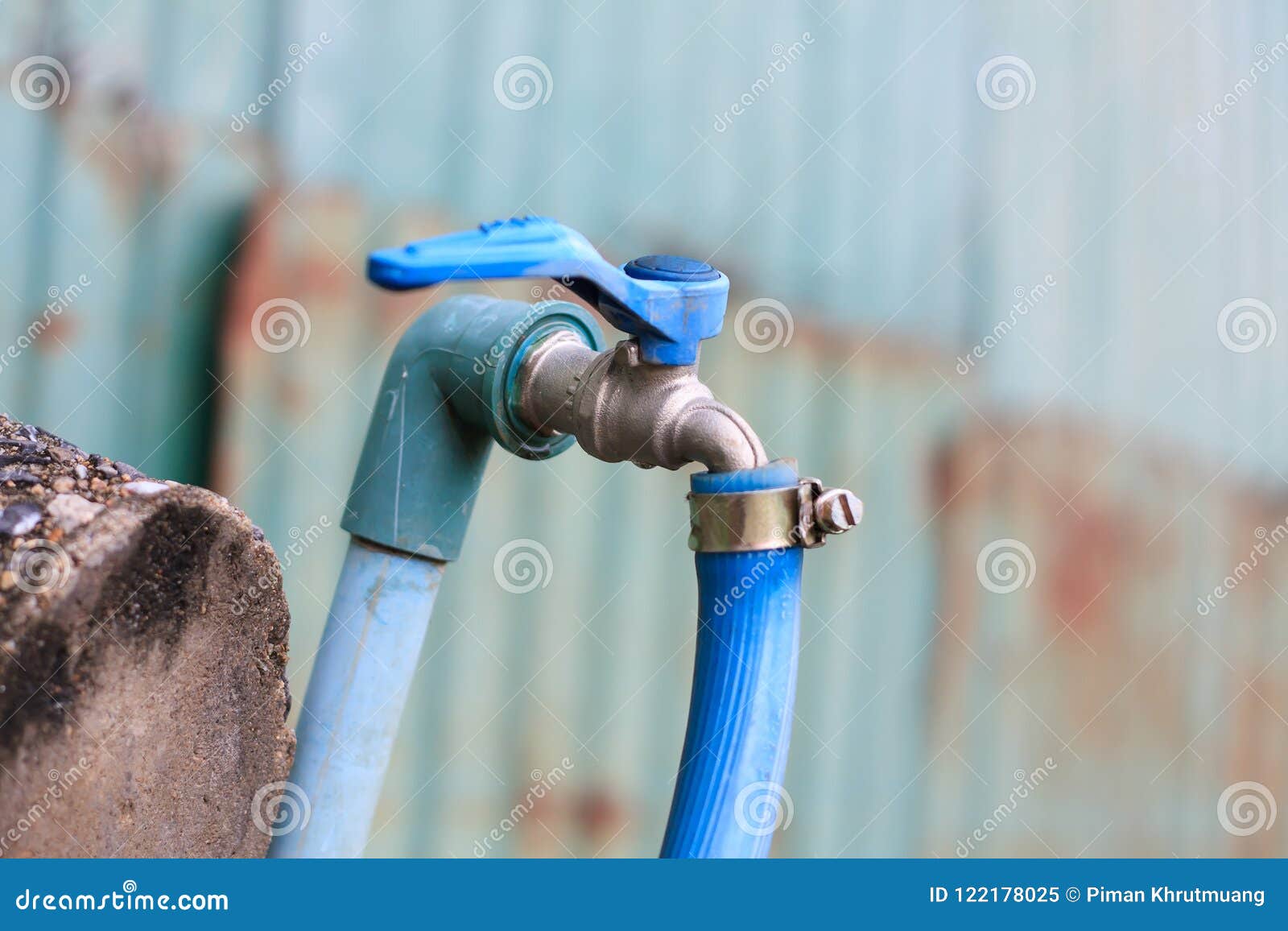 Water tap with rubber line stock image. Image of wall 122178025