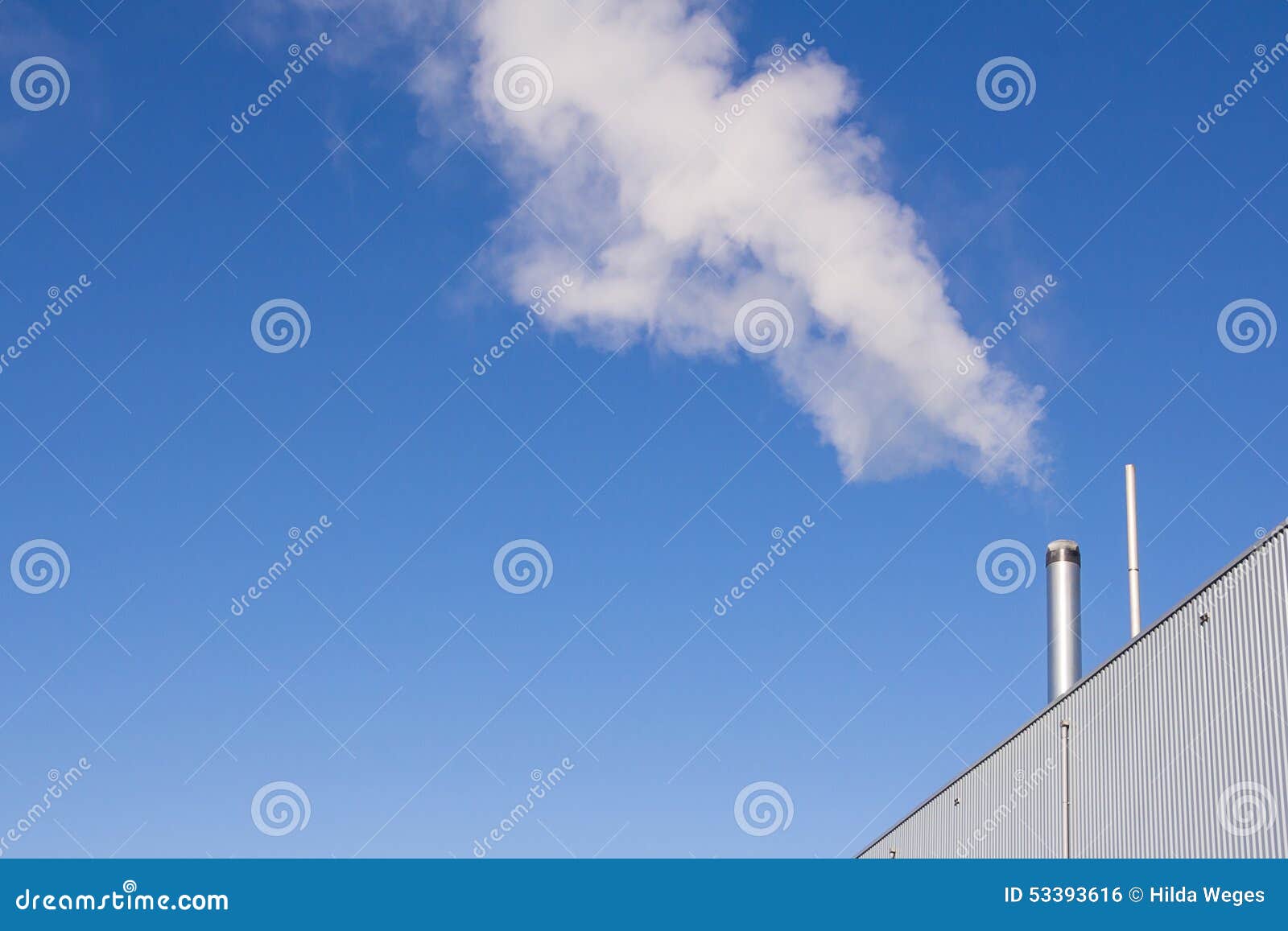 water vapor or steam from a factory