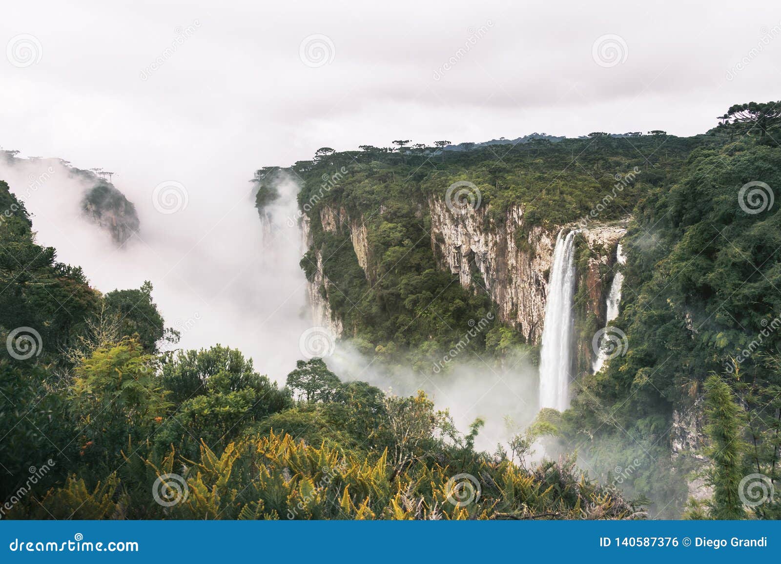 waterfall of itaimbezinho canyon with fog at aparados da serra national park - cambara do sul, rio grande do sul, brazil