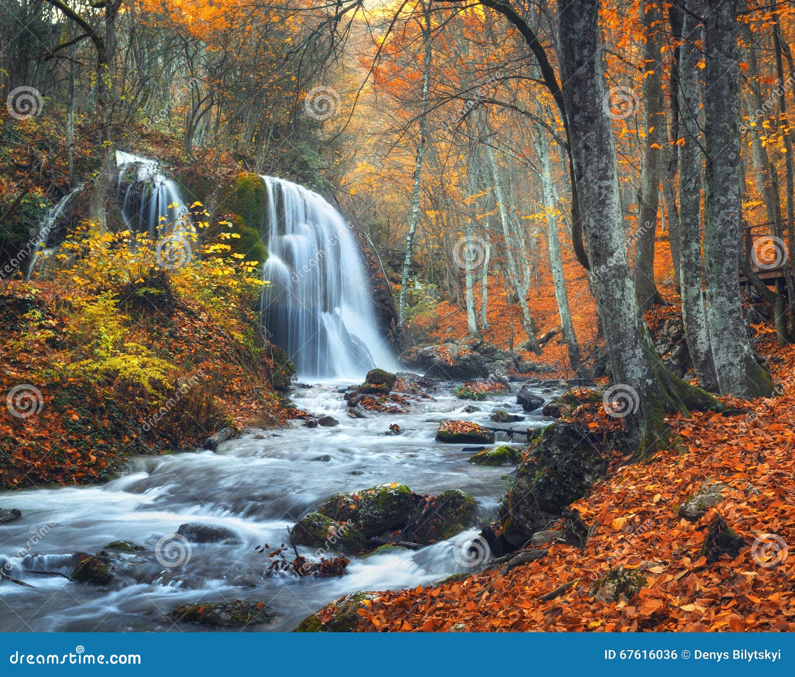 Waterfall At Mountain River In Autumn Forest At Sunset Stock Photo