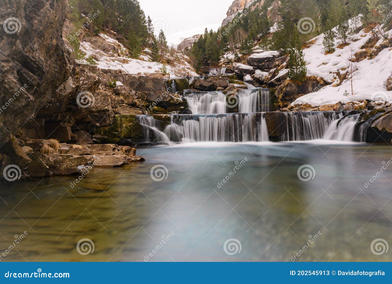 waterfall with the name of oaso steps in the natural park of ordesa in huesca in spain