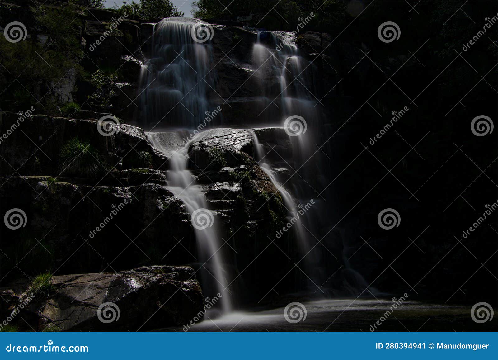 waterfall in the rain forest. tree fern waterfall tropical rain forest paradise. fervenza de casariÃ±os.fervenza da freixa. night