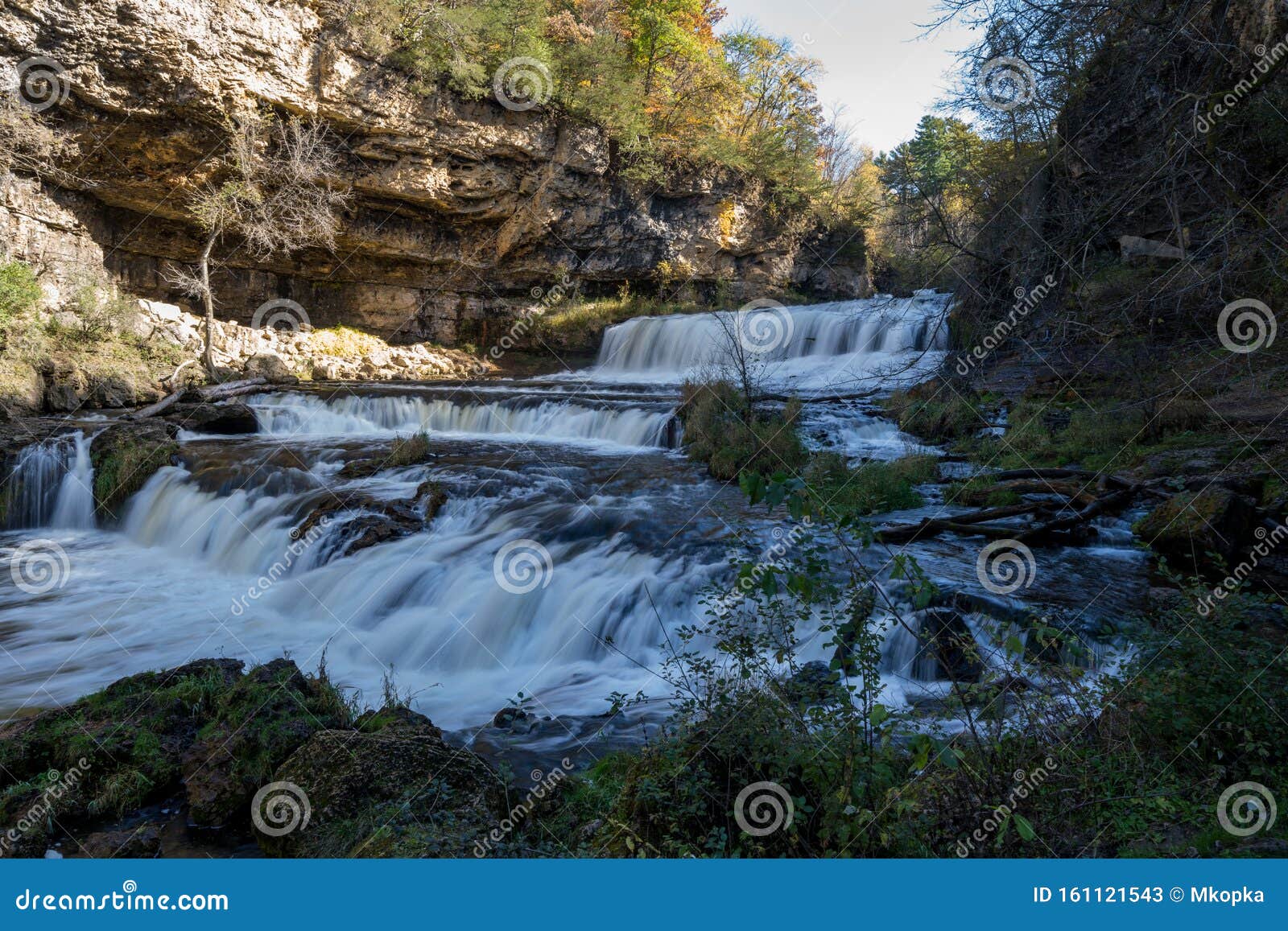 Waterfall at Willow River State Park in Hudson Wisconsin in Fall. Daytime Long Exposure Stock