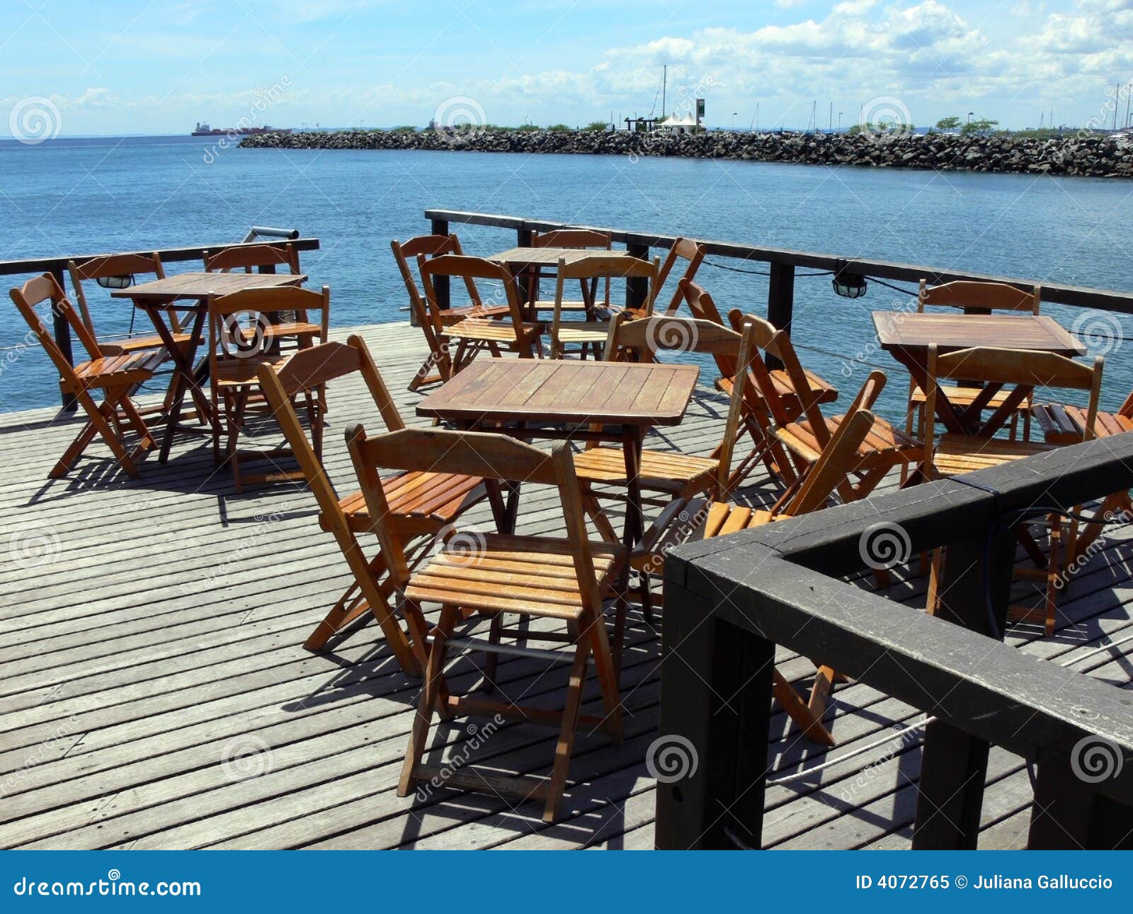 Waterfront deck patio stock image. Image of bright, outdoor 4072765