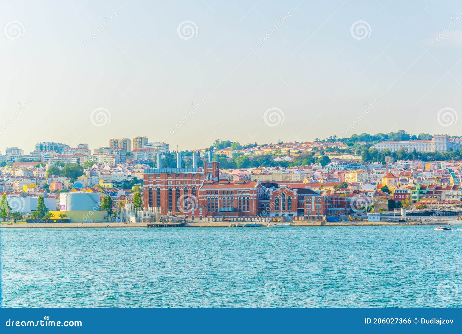 waterfront of river tajo in lisbon with palacio national de ayuda, portugal