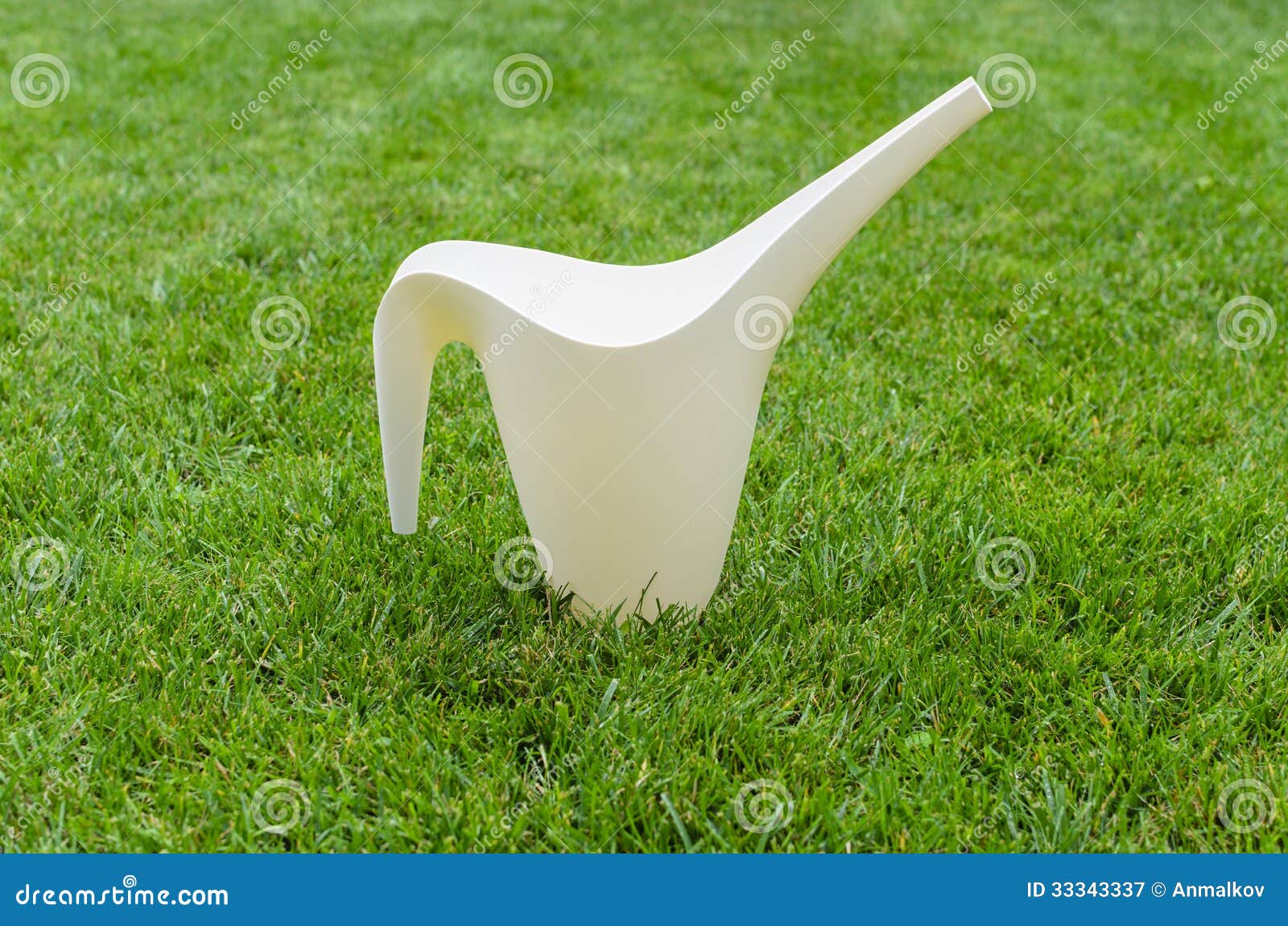 Watering Can on Green Grass Stock Image Image of growth, ecology