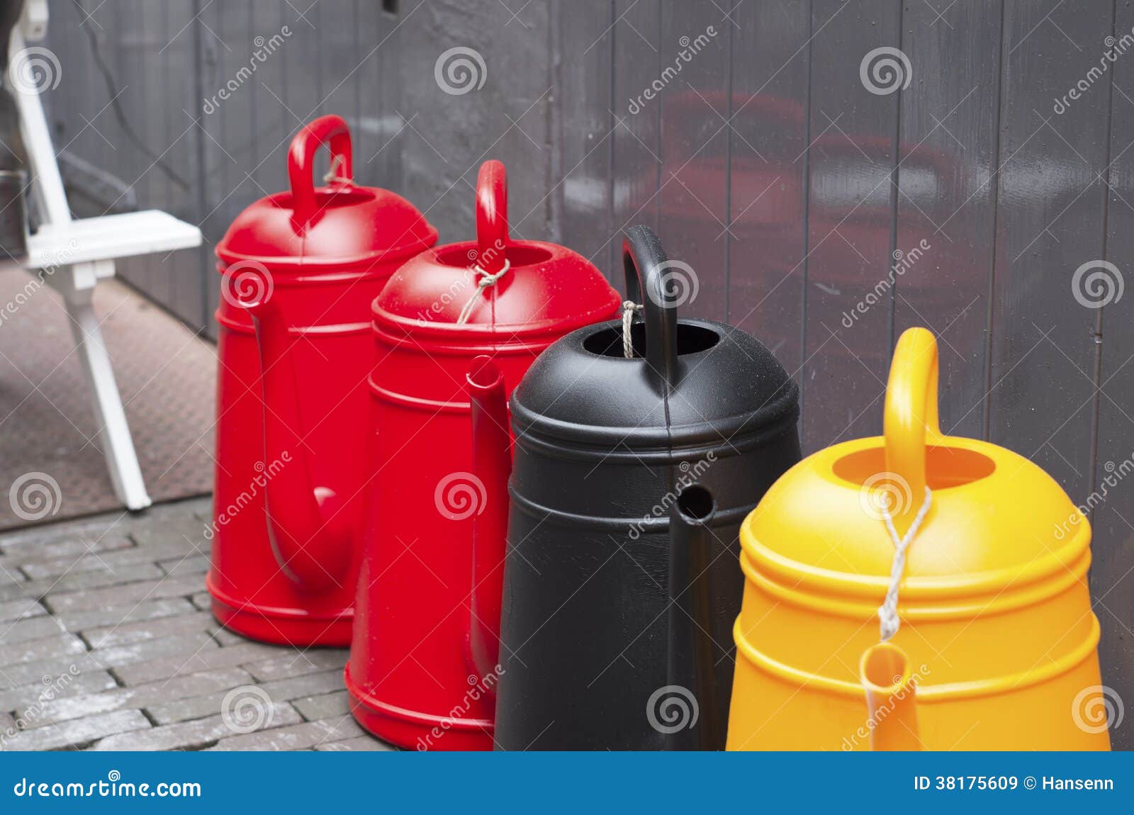 Watering cans stock image. Image of household, black 38175609