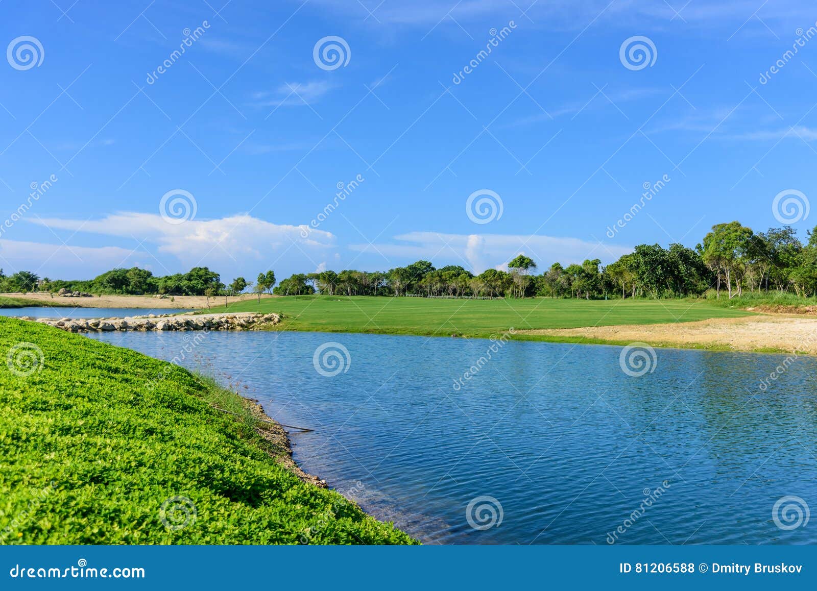 Watering the golf course stock photo. Image of light 81206588