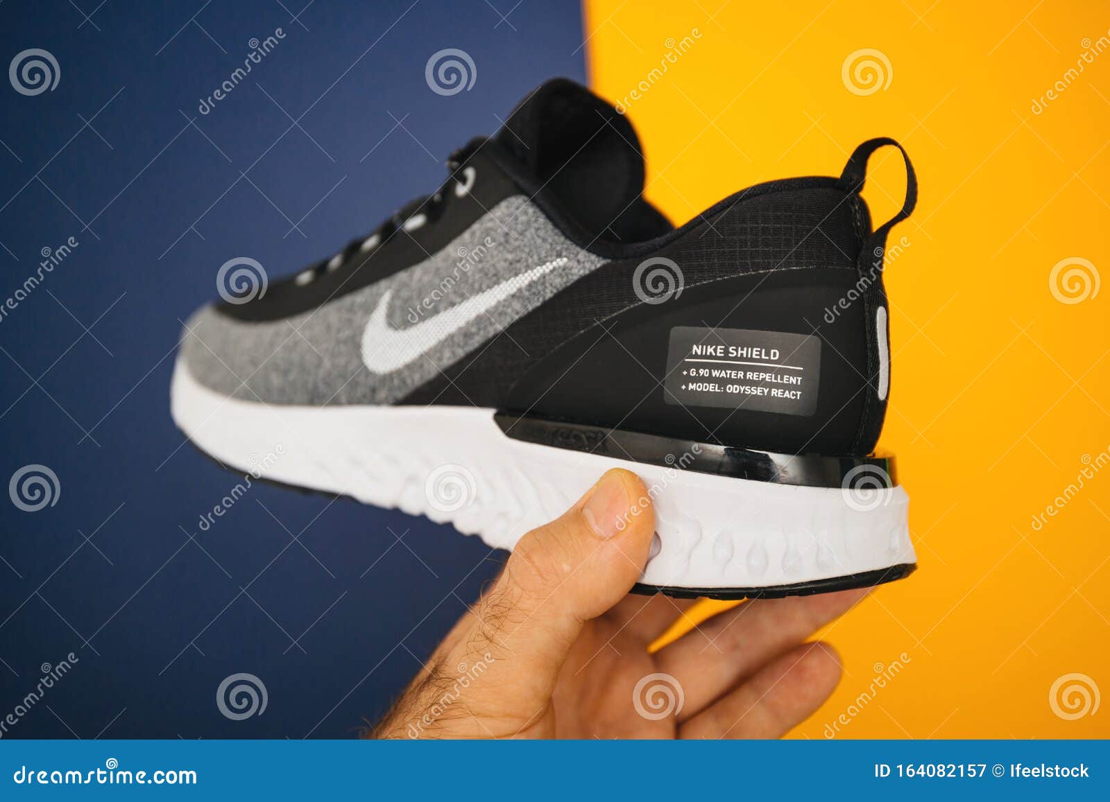 and Windproof Running Shoe Nike Odyssey React in Hand Editorial Photography - Image of footwear, view: