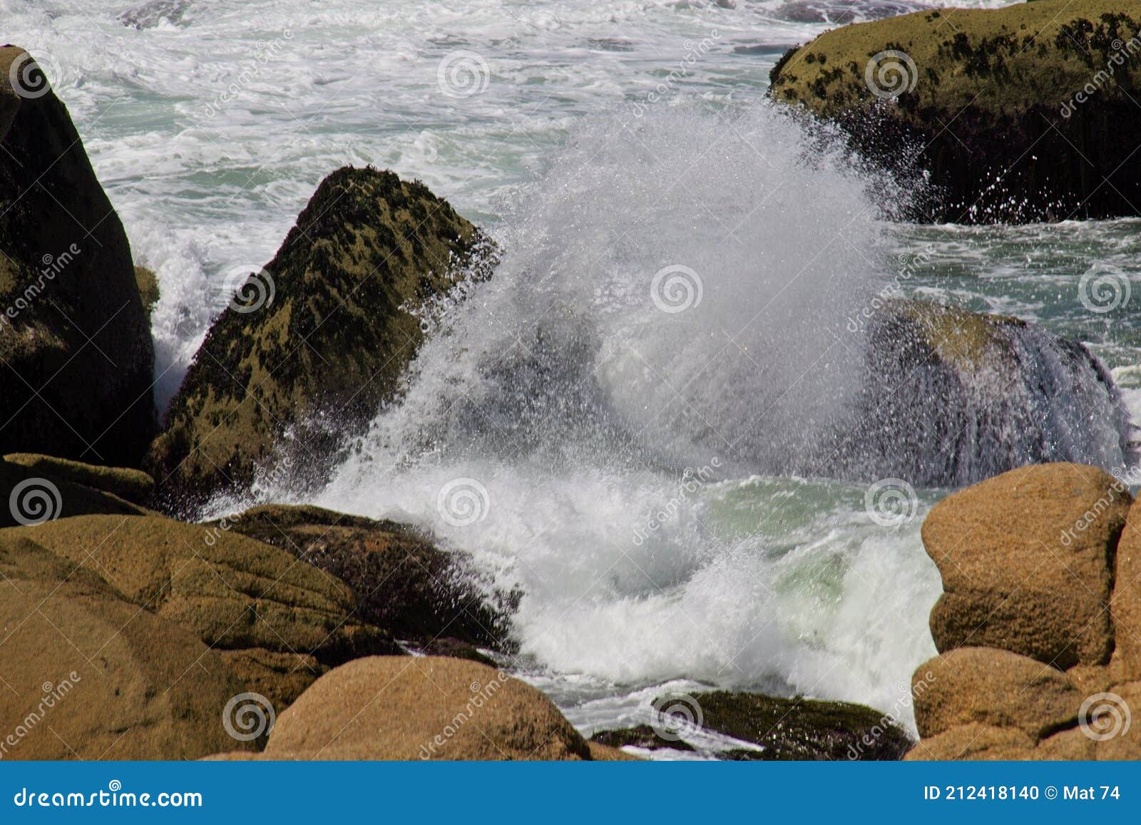 Waves breaking on rocks stock photo. Image of water - 212418140