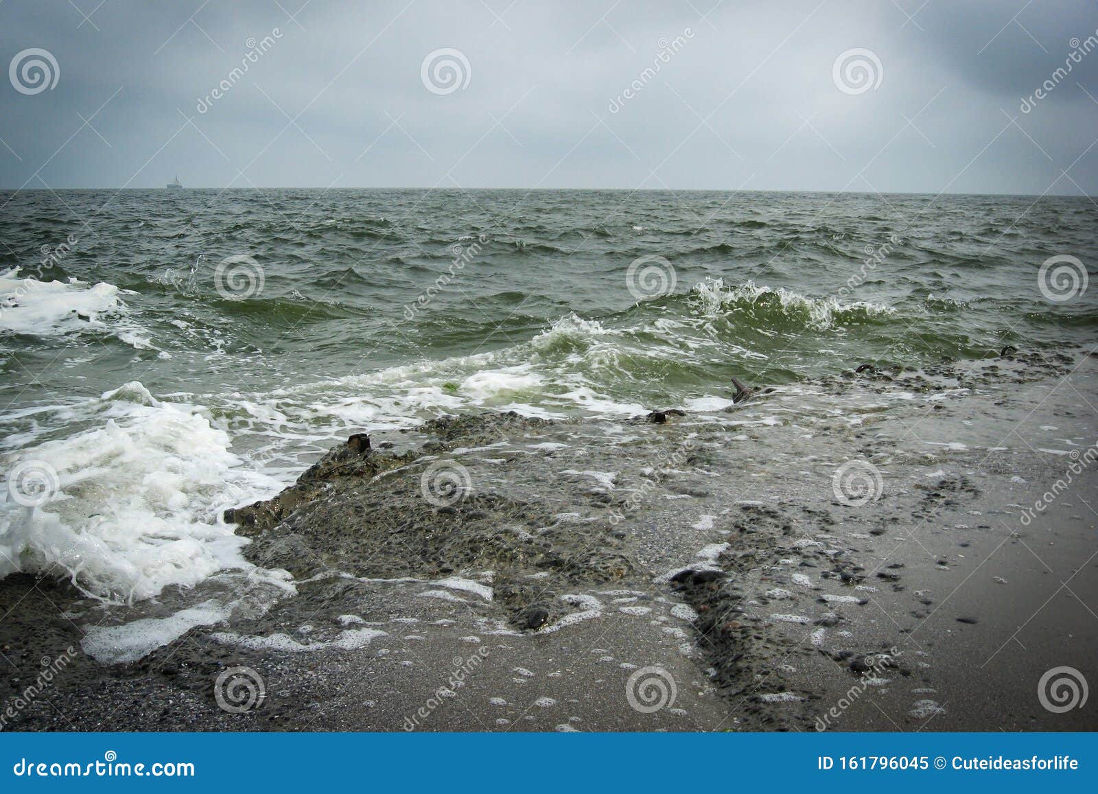 Waves Crashing Against a Rock on the Coast. the Beautiful Scenery of ...