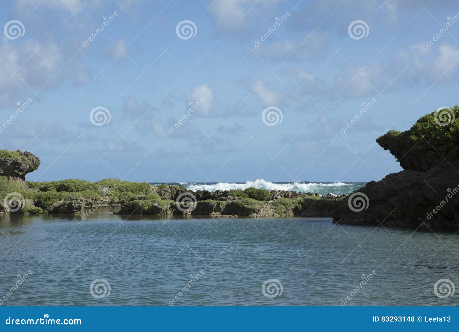 waves crashing on rock formation and cliffs