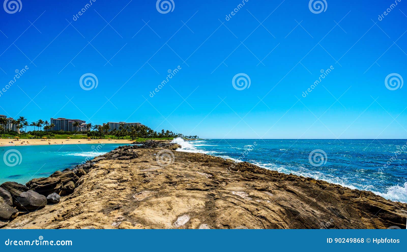 Waves Of The Pacific Ocean Crashing On The Rocks On The Shoreline Of Ko