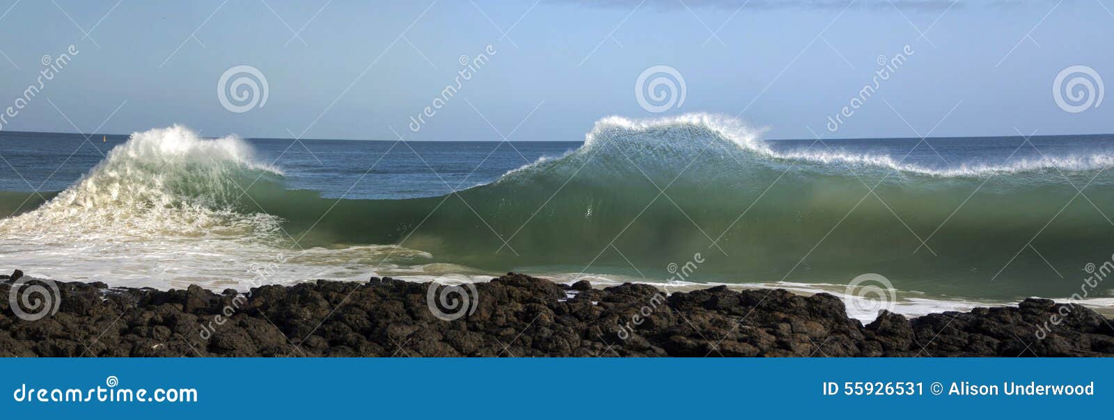 waves pounding on basalt rocks at ocean beach bunbury western australia