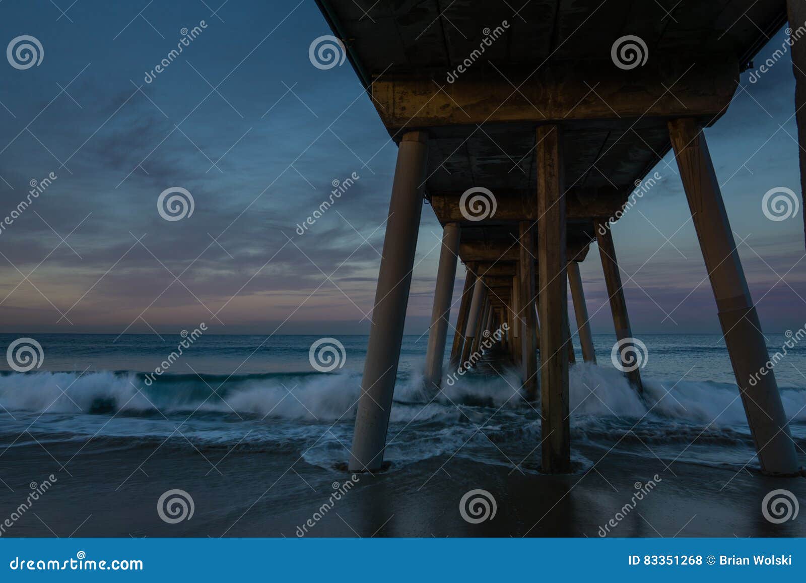 waves under hermosa beach pier