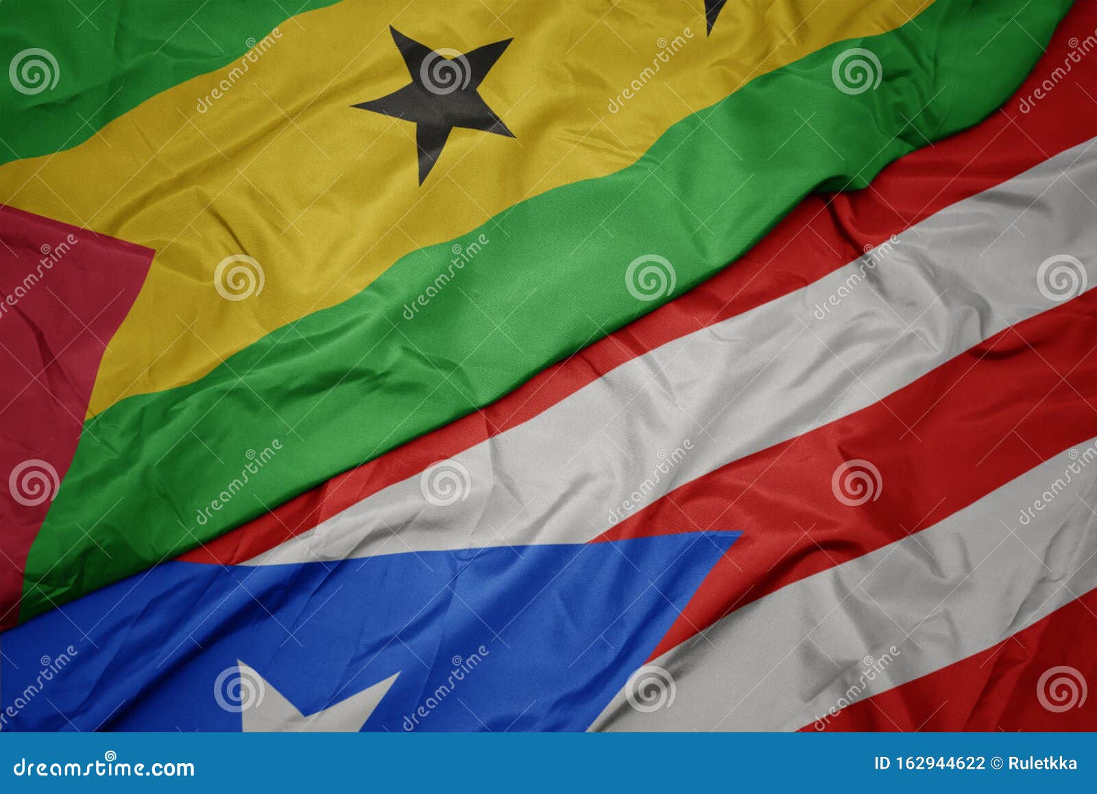 waving colorful flag of puerto rico and national flag of sao tome and principe