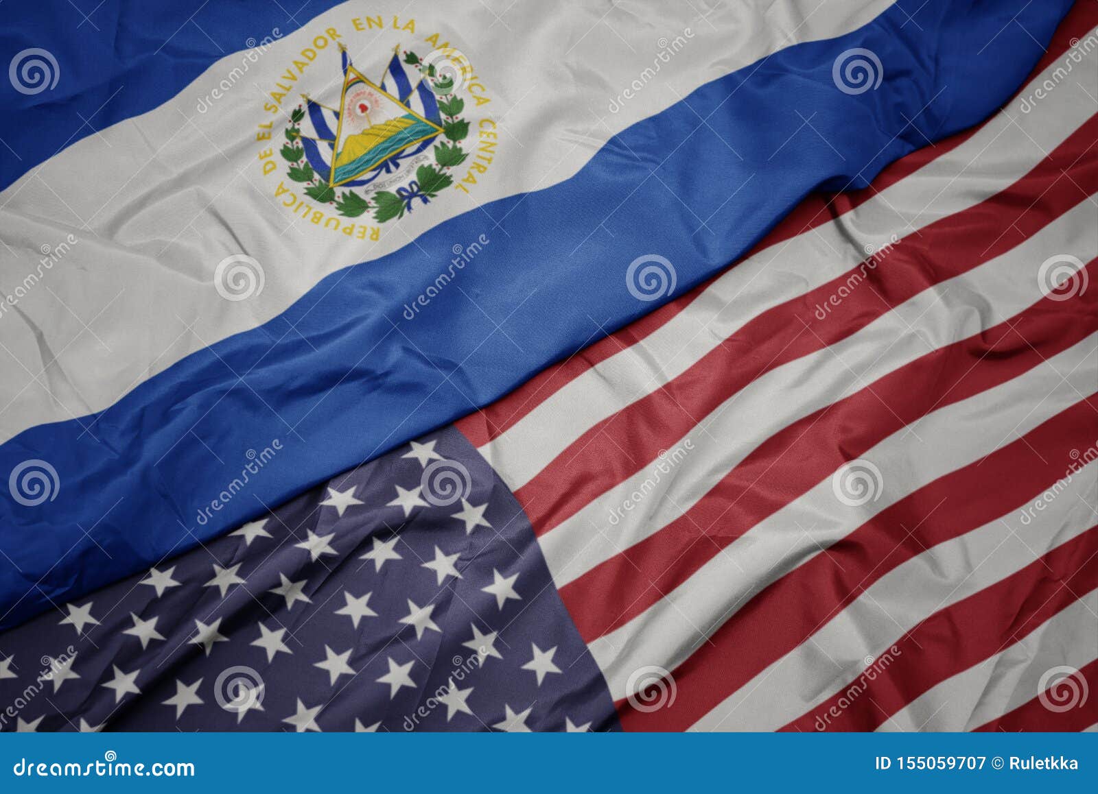 waving colorful flag of united states of america and national flag of el salvador